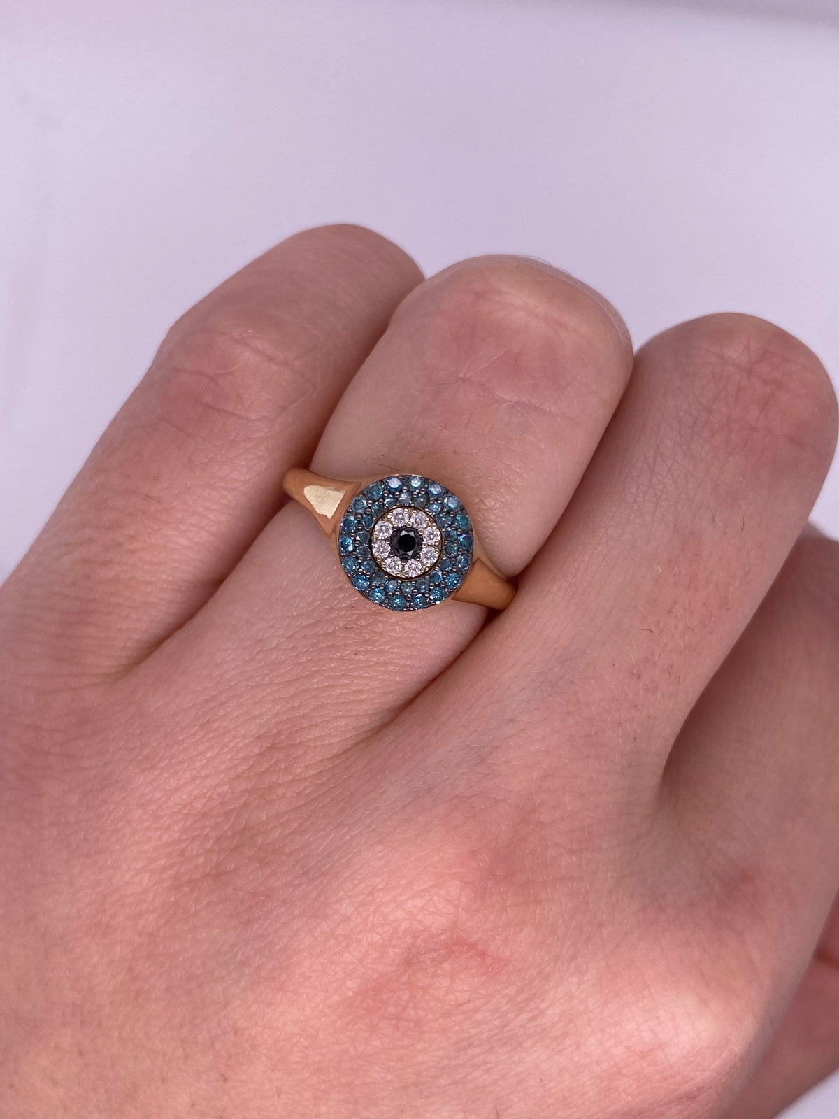A0042 - Anillo ojo con diamantes azules