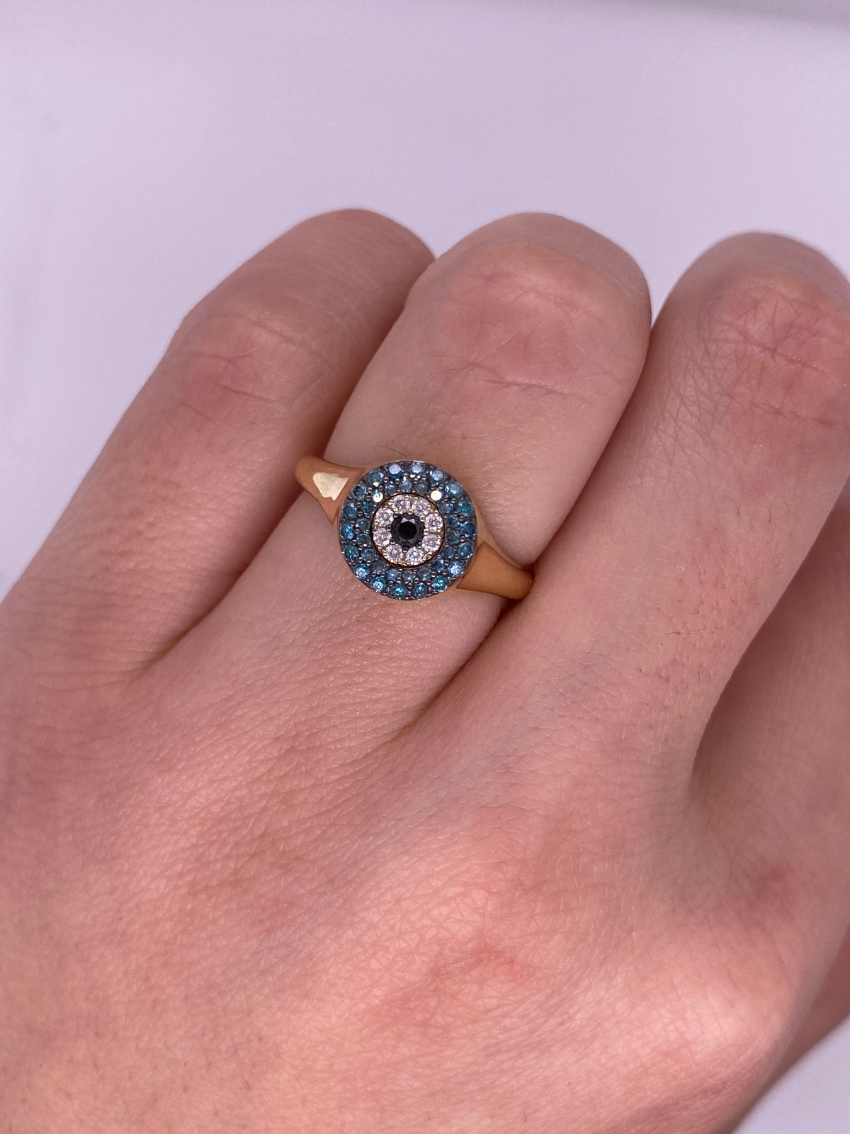 A0042 - Anillo ojo con diamantes azules