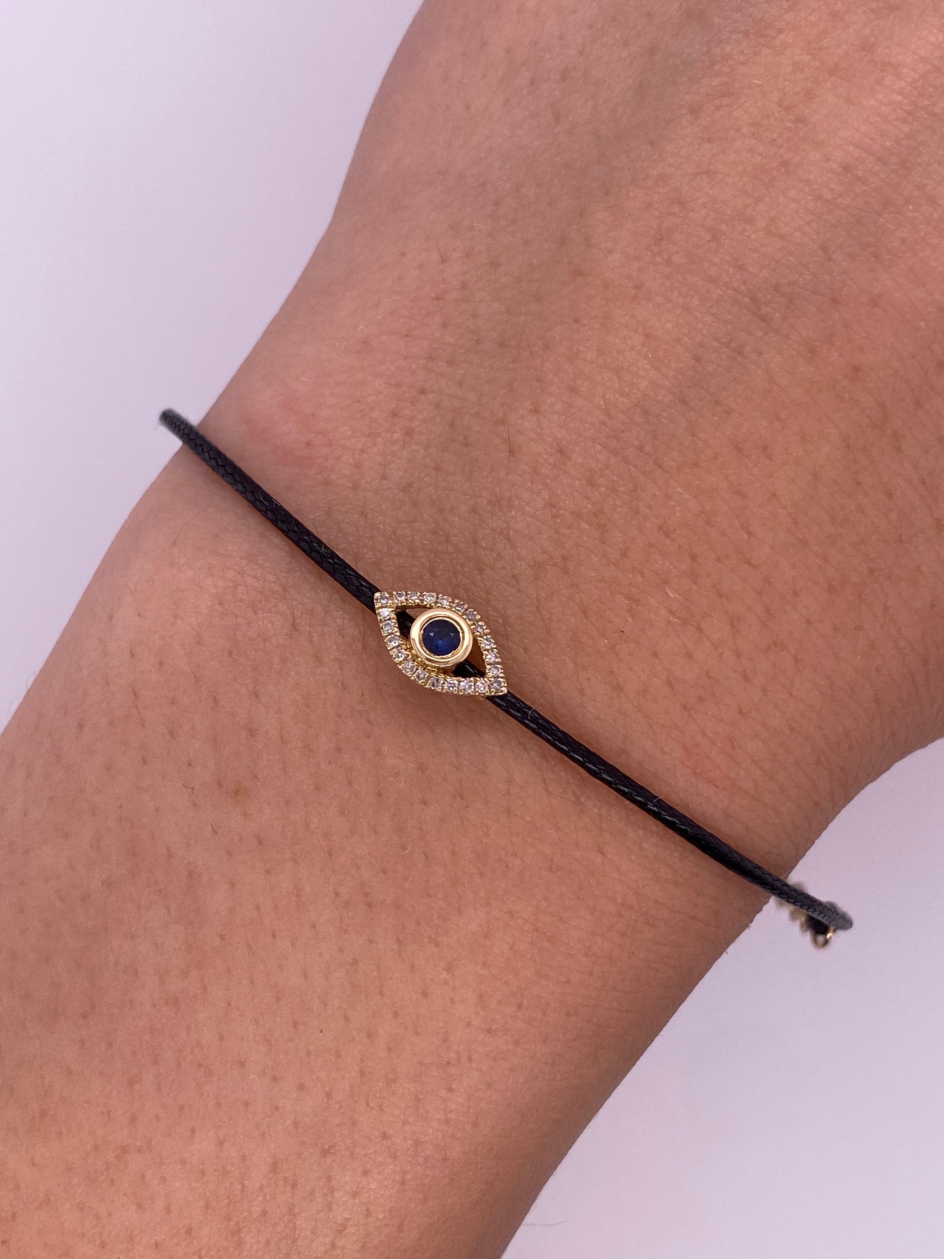 P0060 - Pulsera hilo negro con ojo zafiro y diamante