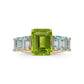 A0089 - Anillo peridoto central con topacio azul